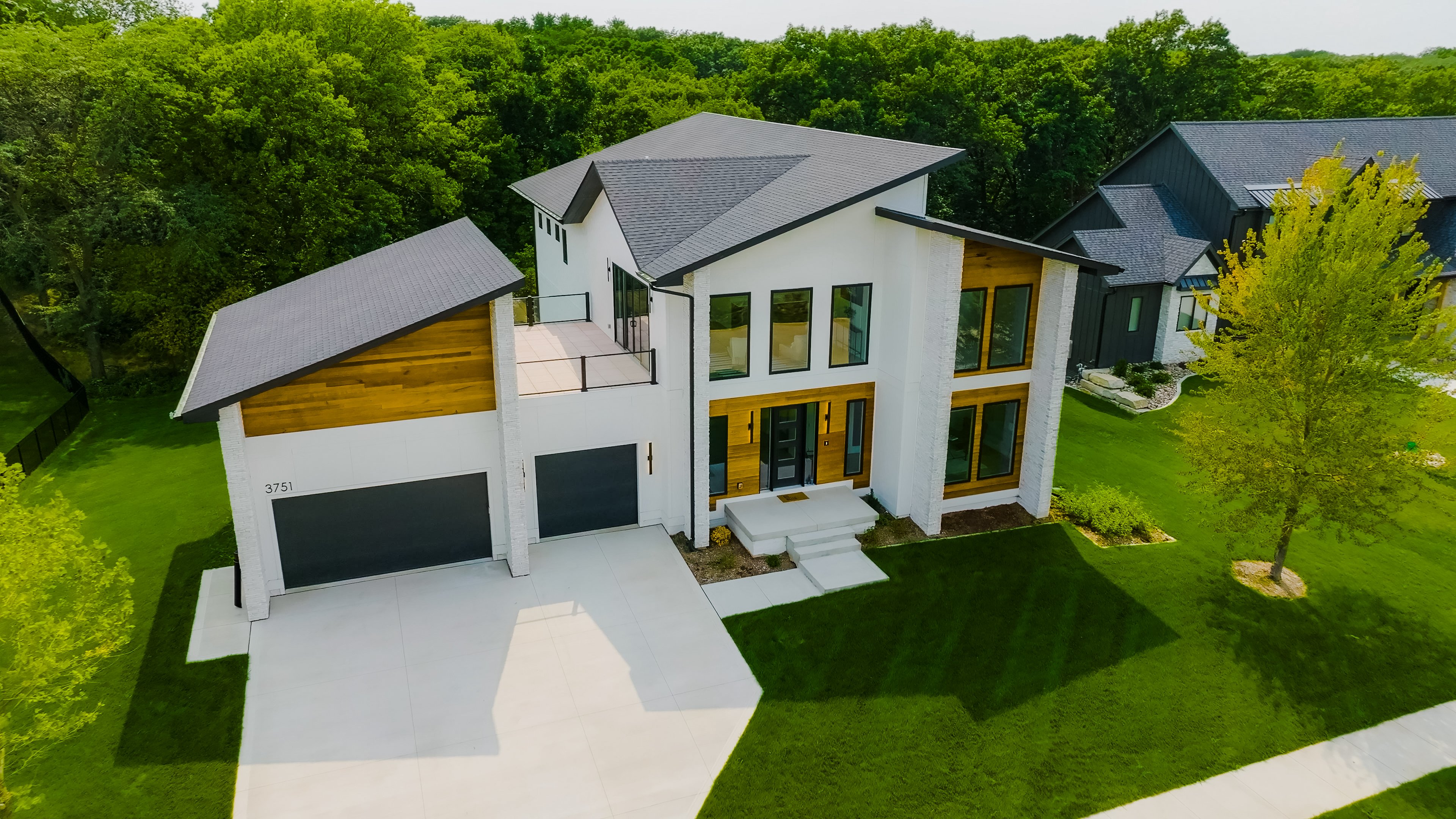 Exterior view of a custom Embarq Signature Homes residence