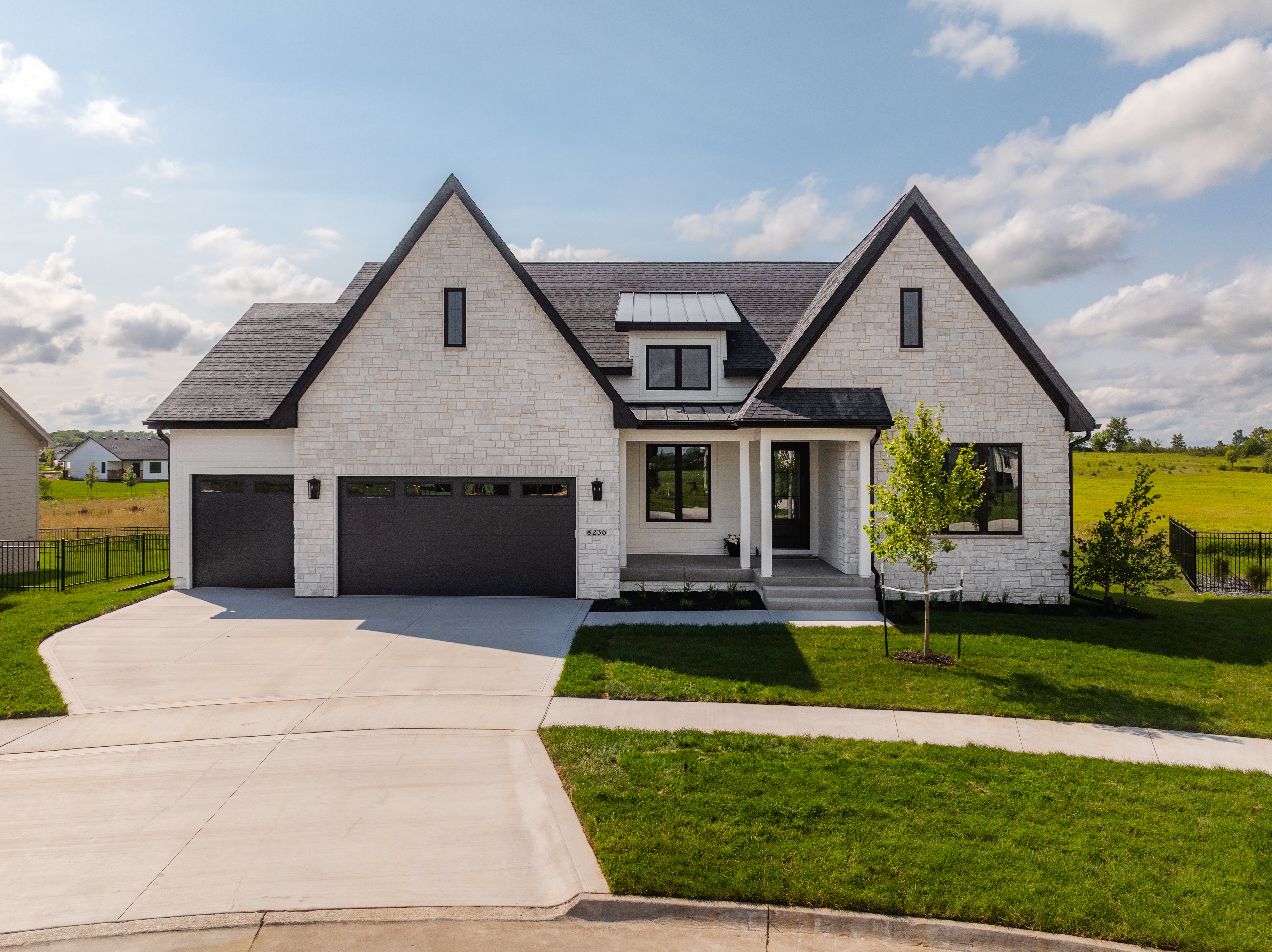 Showcase home exterior by Embarq Signature Homes