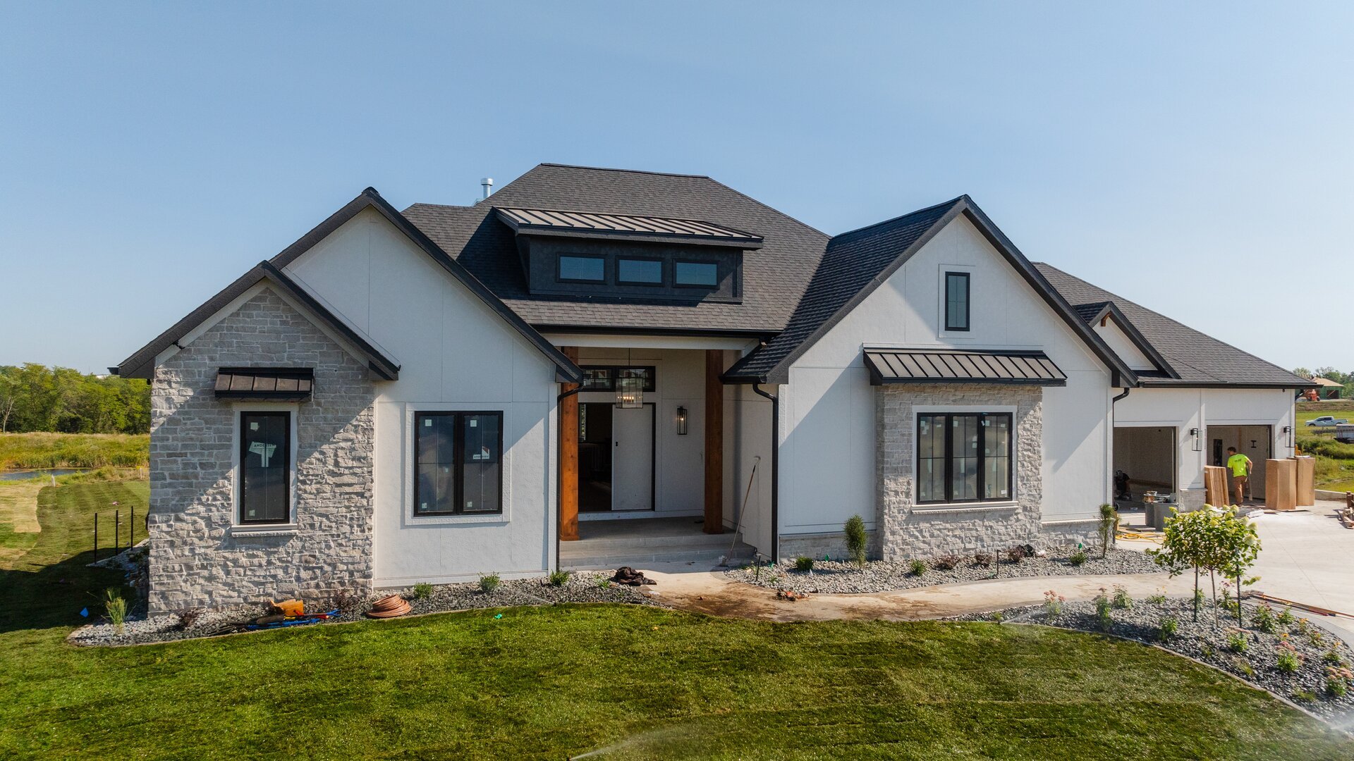 Custom home exterior by Embarq Signature Homes
